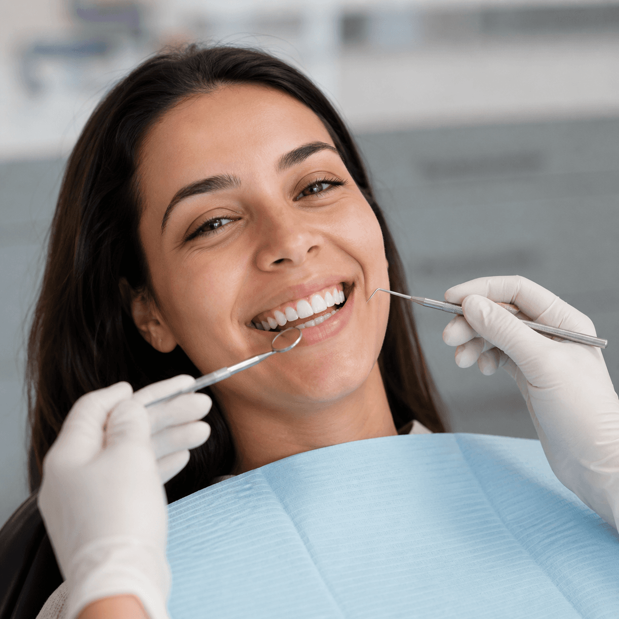 Smiling woman during a dental checkup
